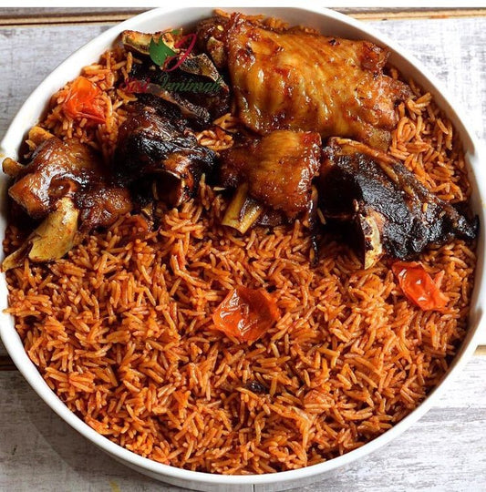 Jollof Rice with ( Turkey or Fish ) and ( Plantain or Salad )